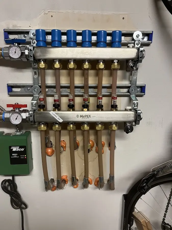 Plumber performing Water Heater Repair at a residential property in Norwood Young America