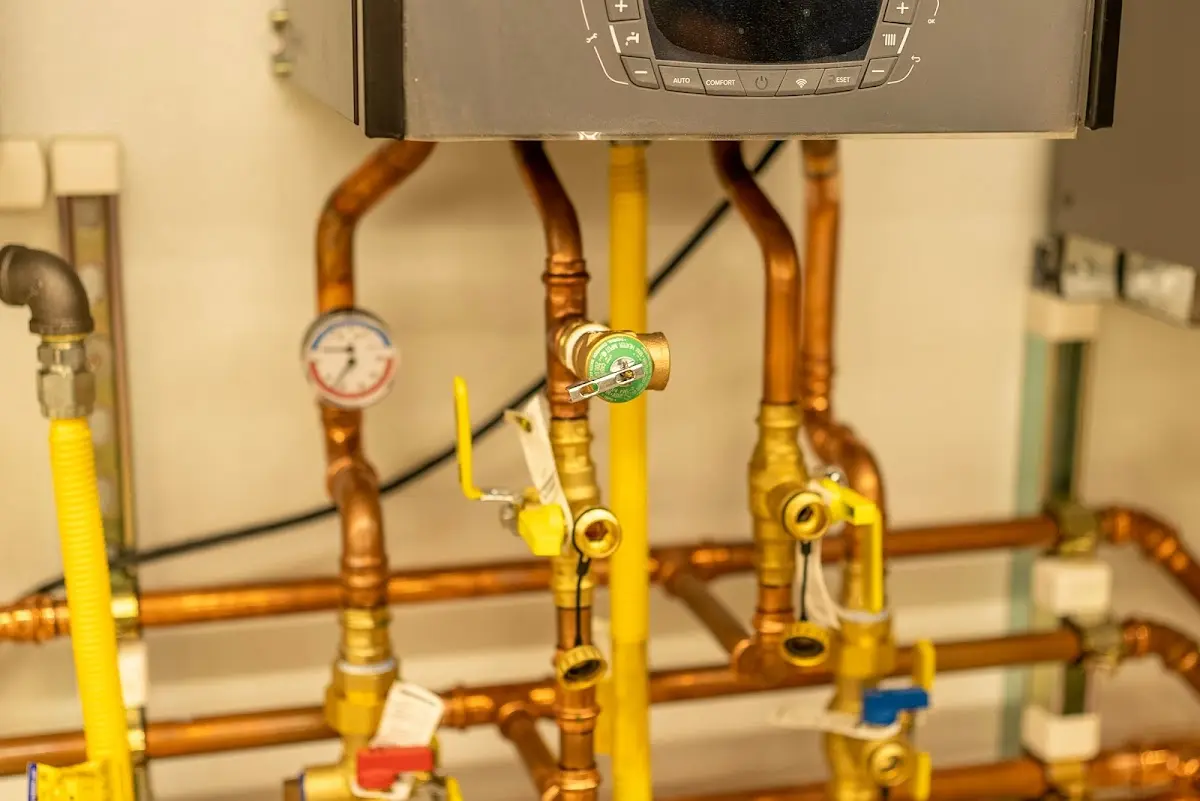 Licensed technician providing Backflow Prevention for a homeowner in Norwood Young America